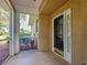 Inviting entryway featuring a screened porch and tile flooring at 912 Barclay Ct, Venice, FL 34293