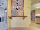 Kitchen bar with a view of the lanai, connecting dining to kitchen space at 912 Barclay Ct, Venice, FL 34293