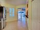 Bright eat-in kitchen features tile floors, sliding doors to patio, and stainless steel refrigerator at 912 Barclay Ct, Venice, FL 34293
