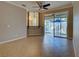 Spacious living room featuring a view of the outdoor patio through large sliding doors at 912 Barclay Ct, Venice, FL 34293
