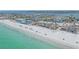 Gorgeous aerial view of the beachfront neighborhood featuring sandy white beach and turquoise water at 9220 43Rd W Ter, Bradenton, FL 34209