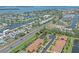 An aerial view of waterfront homes showcases the community and surrounding waterways at 9220 43Rd W Ter, Bradenton, FL 34209