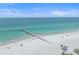 Scenic beach view features a pier, pristine sands, and turquoise waters at 9220 43Rd W Ter, Bradenton, FL 34209