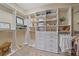 Walk-in closet featuring built-in shelving and drawers at 9220 43Rd W Ter, Bradenton, FL 34209