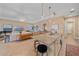 Well-appointed kitchen and open-concept living area with a center island and stainless steel appliances at 9220 43Rd W Ter, Bradenton, FL 34209