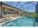 Screened-in pool and patio area with water feature at 9220 43Rd W Ter, Bradenton, FL 34209