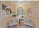 Cozy sitting room featuring neutral walls, modern art, and matching armchairs, creating an intimate space at 9220 43Rd W Ter, Bradenton, FL 34209