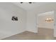 Bedroom featuring tile floors and open doorway to adjoining room at 9823 Haze Dr, Venice, FL 34292