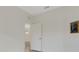 Bedroom featuring tiled floors and doorway at 9823 Haze Dr, Venice, FL 34292