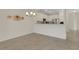 Kitchen and dining area showcasing the stainless steel appliances and open layout at 9823 Haze Dr, Venice, FL 34292