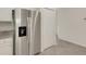 A modern kitchen with stainless steel appliances and a neutral color scheme at 9823 Haze Dr, Venice, FL 34292