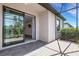 Screened-in patio with brick flooring is perfect for outdoor living and entertaining at 9823 Haze Dr, Venice, FL 34292