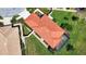 This single-Gathering home has beautiful landscaping, a tile roof, and a large screened-in lanai at 102 Mestre Pl, North Venice, FL 34275