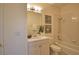 Cozy bathroom with shower-tub combo and modern vanity at 102 Mestre Pl, North Venice, FL 34275