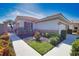 Charming single-story home with manicured landscaping and a well-maintained walkway leading to the entrance at 102 Mestre Pl, North Venice, FL 34275