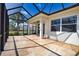 Covered lanai showcasing decorative flooring and a scenic view at 102 Mestre Pl, North Venice, FL 34275
