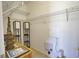 A functional walk-in closet offers ample storage with shelving, and a clean, organized design for your belongings at 102 Mestre Pl, North Venice, FL 34275