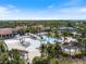 Expansive aerial view of community pool, offering a resort-style living experience at 10209 Fiddlewood Dr, Venice, FL 34293