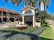 Welcome to Venice, FL sign with beautiful landscaping, and a commercial building nearby at 10209 Fiddlewood Dr, Venice, FL 34293