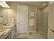 Bathroom features single vanity and glass-enclosed shower at 10410 Inglenook Ter, Palmetto, FL 34221