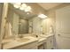 Bathroom features double vanity and glass-enclosed shower at 10410 Inglenook Ter, Palmetto, FL 34221