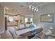 Open floorplan shows dining area with kitchen and living room at 10410 Inglenook Ter, Palmetto, FL 34221