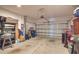 Spacious garage with an automatic door, ample room for parking and storage at 10410 Inglenook Ter, Palmetto, FL 34221
