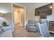 Comfortable office featuring a flat screen television, desk, and ensuite bathroom at 10410 Inglenook Ter, Palmetto, FL 34221