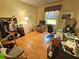 Office space with hardwood floors, natural light, and a work space at 10930 Lerwick Cir, Englewood, FL 34223