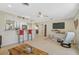 Inviting living area features a seamless transition to the kitchen with a breakfast bar for casual dining at 1099 Nokomis S Ave, Venice, FL 34285