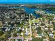 Breathtaking aerial view showcasing the waterfront neighborhood, community layout and local landscaping at 1103 Lucille Ave, Nokomis, FL 34275