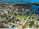 A distant aerial view shows the location of the home near other homes and a large river at 1103 Lucille Ave, Nokomis, FL 34275