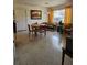 View of dining area shows natural light and an adjacent sitting area at 1103 Lucille Ave, Nokomis, FL 34275