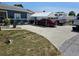 Exterior of home featuring yard with space for parking and a covered area at 1103 Lucille Ave, Nokomis, FL 34275