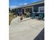 Cozy home with a stone walkway leading to the entrance at 1103 Lucille Ave, Nokomis, FL 34275