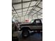 Spacious garage with ample room for a truck, storage, and workspace at 1103 Lucille Ave, Nokomis, FL 34275