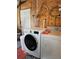 Efficient laundry setup with modern washer and dryer, ensuring convenient chore management at 1103 Lucille Ave, Nokomis, FL 34275