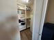 Organized closet with shelves and hanging space for clothing and accessories at 1154 Bird Bay Way # 303, Venice, FL 34285
