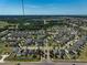 Aerial view of a well-planned community surrounded by greenery and lakes at 12014 Creek Preserve Dr, Riverview, FL 33579