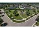 Neighborhood aerial showcasing a playground, landscaping, and sidewalks at 12014 Creek Preserve Dr, Riverview, FL 33579