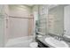 Full bathroom featuring a shower-tub combo and granite vanity top at 12014 Creek Preserve Dr, Riverview, FL 33579