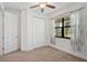Bright bedroom with a closet, window, and neutral carpeting at 12014 Creek Preserve Dr, Riverview, FL 33579