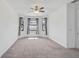 Large carpeted bedroom boasting a ceiling fan and bay windows at 12014 Creek Preserve Dr, Riverview, FL 33579