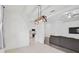 Open dining area with a view of the modern kitchen and comfortable living room at 12014 Creek Preserve Dr, Riverview, FL 33579