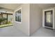 Inviting front entrance featuring a stylish door with decorative glass and a covered porch area at 12014 Creek Preserve Dr, Riverview, FL 33579