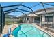 Beautiful screened-in pool and backyard, ideal for relaxation and entertaining at 12014 Creek Preserve Dr, Riverview, FL 33579
