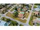 A bird's-eye perspective showing a single-Gathering home with a backyard pool in a residential area at 1203 Hudson Rd, Venice, FL 34293