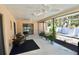 Covered, screened lanai for outdoor living and entertaining at 1203 Hudson Rd, Venice, FL 34293