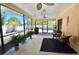 Relaxing screened lanai provides views of the backyard pool at 1203 Hudson Rd, Venice, FL 34293