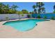 Inviting backyard pool and patio with landscaping at 1203 Hudson Rd, Venice, FL 34293